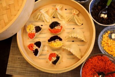 2.5hrs Chinese Kitchen Cooking Class: Art Steamed Dumplings - From Kneading Dough to Rolling It Chinese-Style