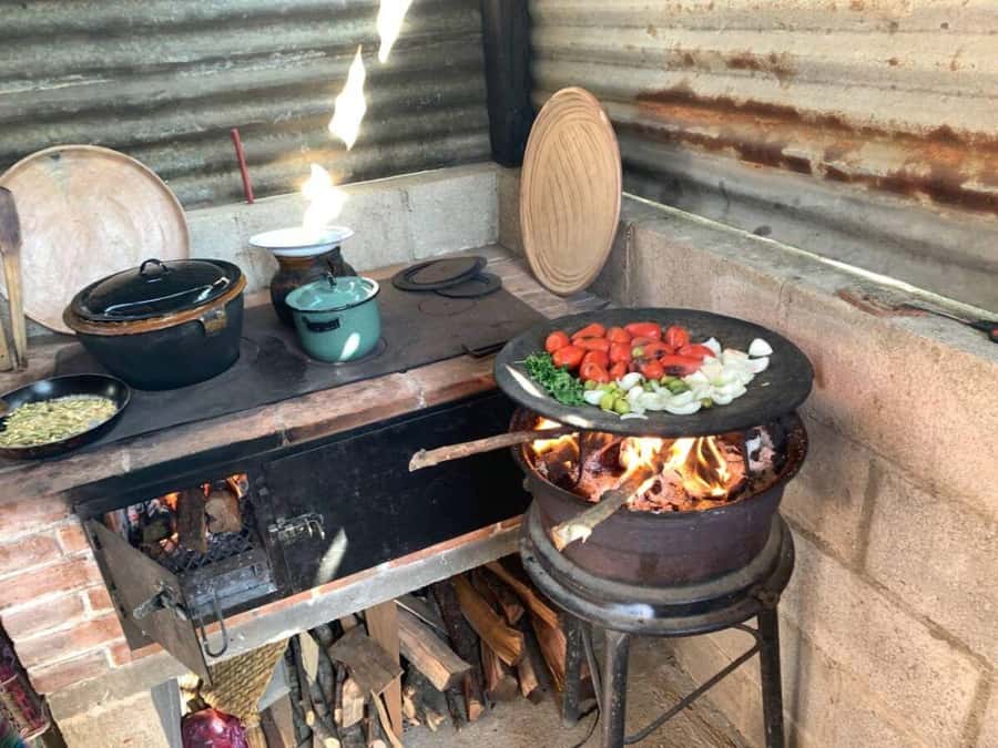 Antigua: Cooking Class with Local Family - Grinding on a pedernal stone: the first real taste of tradition