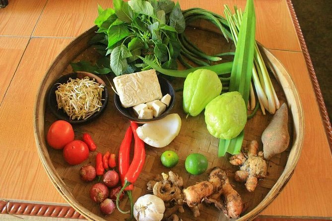 Balinese Cooking Class with Traditional Market Tour - The open kitchen and compound-home setup: doing, not just watching