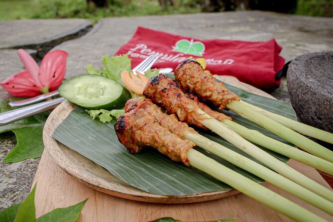 Balinese Farm Cooking Class by Pemulan Bali - Picking produce on the farm: a real lesson, not a photo stop