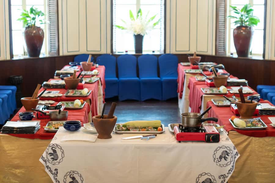 Bangkok: Blue Elephant Thai Cooking Class - Hands-on cooking stations: burners, wok, and guidance