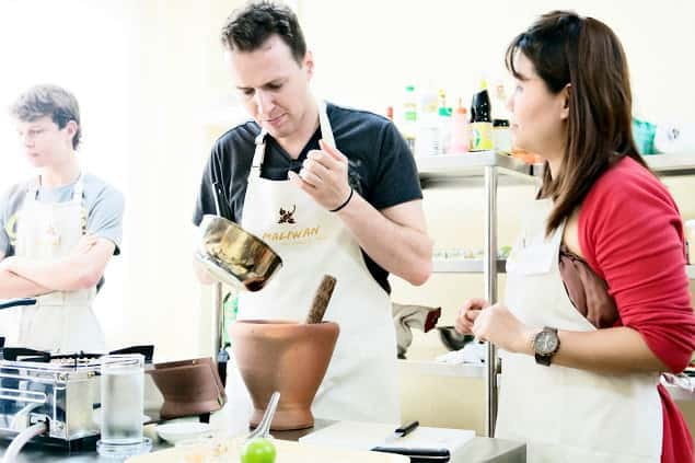 Bangkok: Maliwan Thai Cooking Class with Market Tour - Welcome drink, a quick reset, then cooking starts with demos
