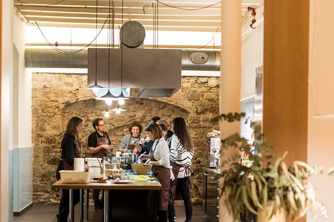 Barcelona Culinary Experience: Paella & Tapas Cooking Class - Key highlights you’ll feel right away