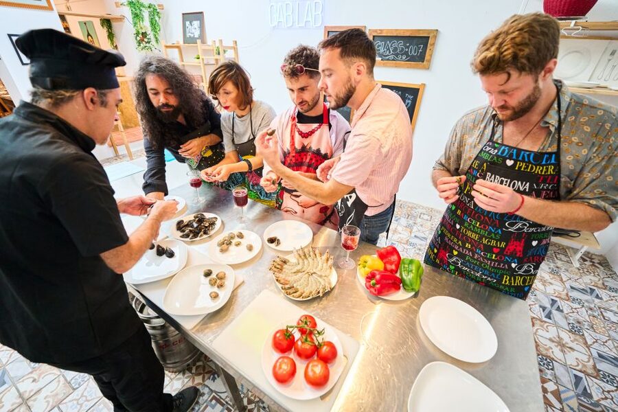 Barcelona: Paella Cooking Class with Market Visit and More - Tapas tasting and dessert: the meal feels like Barcelona, not filler