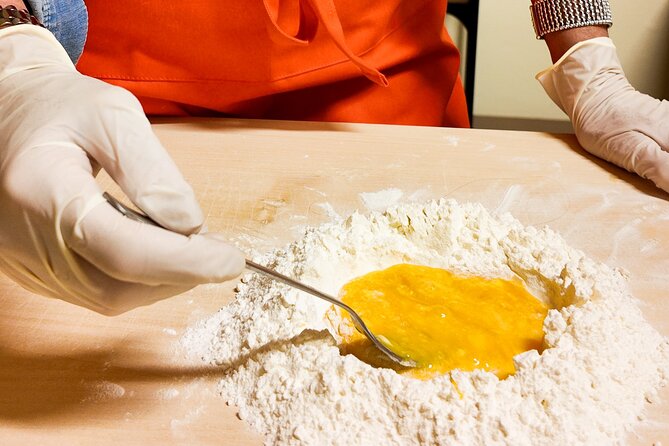 Bologna Local Pasta Cooking Class, Ragu, Spritz, Wine & Gelato - Handmaking tagliatelle: dough, rolling, and cutting without machines