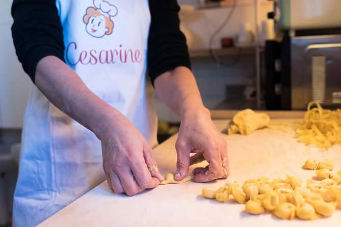 Cesarine: Market Tour & Cooking Class at Local's Home in Bologna - The market stop: learning what to buy and why