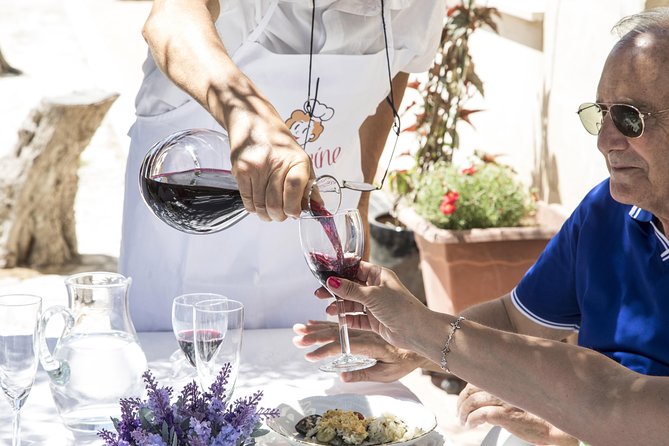 Cesarine: Market Tour & Home Cooking Class in Bari - Eating together with local wines and a sea-view table