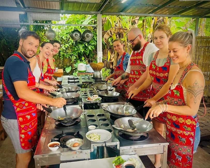 Chiang Mai: Cooking Class, Market and Thai Herbs Garden Tour - Making curry paste from scratch: the signature skill of the day