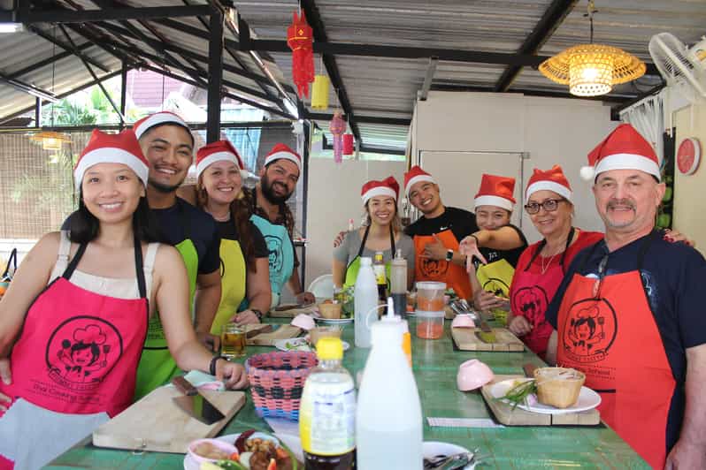 Chiang Mai: Half Day Evening Cooking Class with Market Tour - Yummy Tasty Thai Cooking School: snacks, setup, and your own station