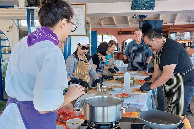 Cooking Class and Wine Tasting in Santorini - Cooking Greek dishes on a Santorini winery patio