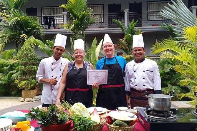 Cooking Class By Reveal Angkor Hotel Siem Reap - Eating alfresco in the hotel gardens (and finally judging your results)