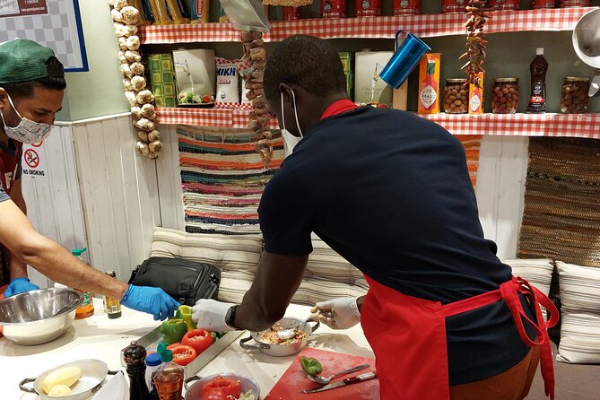 Cooking Class in Athens with Shopping in Central Market & Lunch - Aprons and gloves: small comfort, real practicality