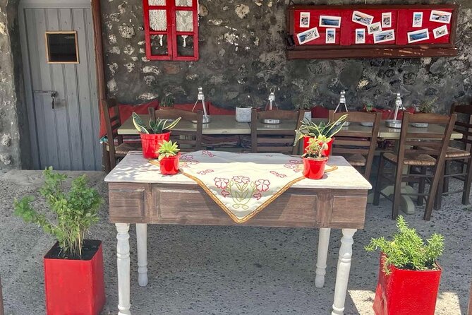 Cooking Class in Traditional cave house in Santorini! - Assyrtiko wine during prep and lunch: the pacing detail you’ll notice