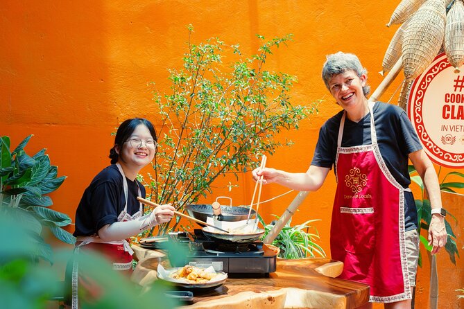 Experience Hanoi Cooking Class with Free Wine Tasting - Key highlights you’ll feel immediately