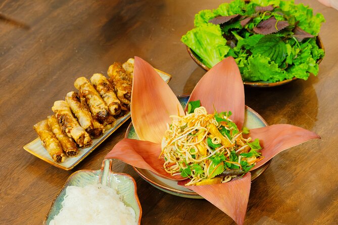 Experience Hanoi Cooking Class with Free Wine Tasting - Entering Hanoi through Đồng Xuân Market