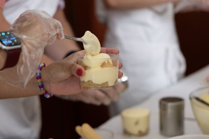 Fettuccine Ravioli and Tiramisu Cooking Class in Rome - The Meal Moment: Sauce Choices, Wine, and a Final Sip