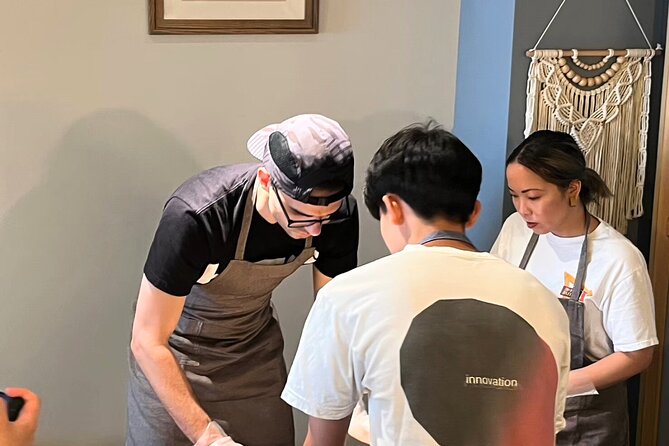 Giant Sushi Cooking Class: Make a 1.5m Sushi Roll in Tokyo - The cafe vibe: snacks, social games, and an easy start