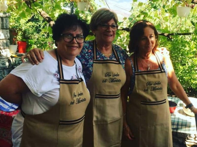Gjirokastër: Traditional Albanian Vegetarian Cooking Class - Meet Marjeta and settle in with raki or a soft drink
