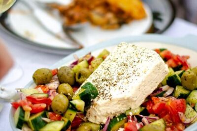 Greek Cuisine Cooking Class in Santorini with Recipes and Wine - The Dishes You’ll Cook: Tzatziki, Greek Salad, Tomato Fritters, Pasticio (or Vegetarian)