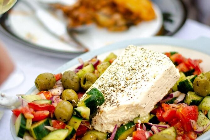 Greek Cuisine Cooking Class in Santorini with Recipes and Wine - The Dishes You’ll Cook: Tzatziki, Greek Salad, Tomato Fritters, Pasticio (or Vegetarian)