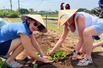 Hand on Vietnamese Cooking class with Ms hanh - Tra Que Vegetable Village: Planting, Fertilizer Buckets, and Watering Greens