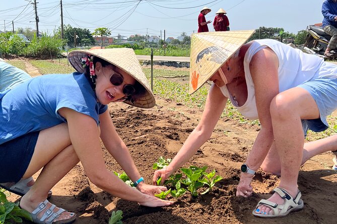 Hand on Vietnamese Cooking class with Ms hanh - Tra Que Vegetable Village: Planting, Fertilizer Buckets, and Watering Greens