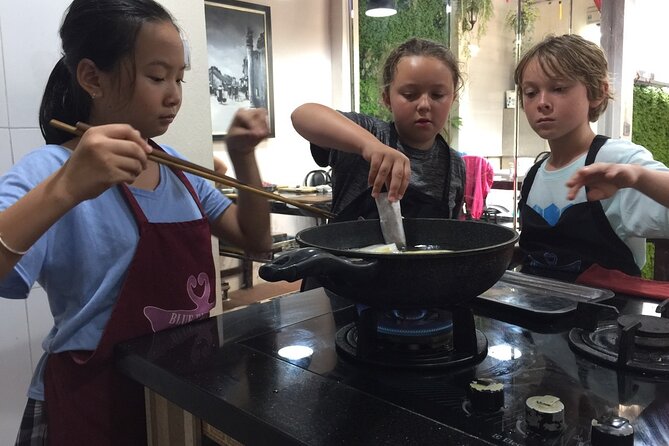 Hanoi Cooking Class and Market Tour in Ancient House - Hands-On Cooking: Four Dishes, Real Stove Time