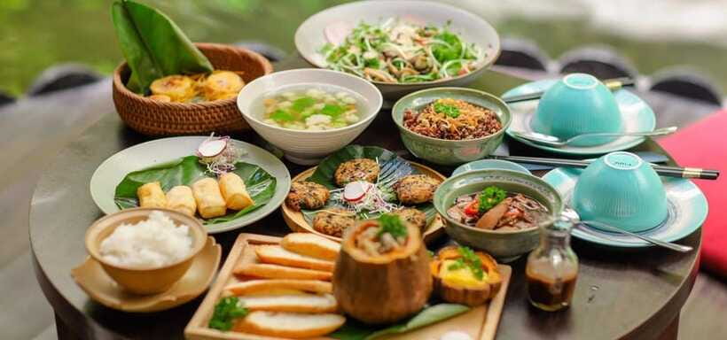 Hanoi Vegan Cooking Class: A Vietnamese Culinary Adventure - Dinner at the table: your multi-course feast and local drinks
