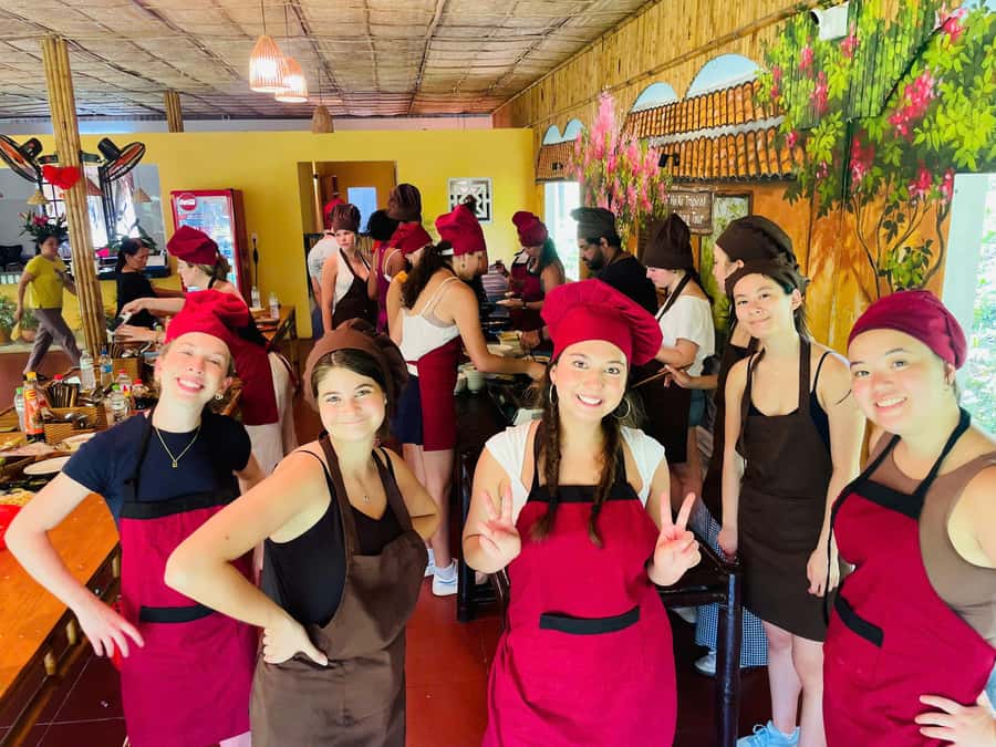 Hoi An: Cooking Class in Coconut Jungle with Market Tour - Bamboo basket boat through coconut waterways: calm scenery, active fun