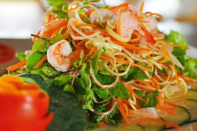 Hoi An Cooking Class With Market Tour and Bamboo Basket Boat Ride - Bay Mau Coconut Village: round bamboo basket boat in the palm waterways