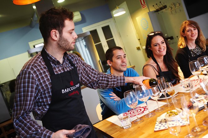 Interactive Paella & Market: Bottomless Wine & Rambla Views - Market Shopping at Boqueria: Buying Like a Barceloní