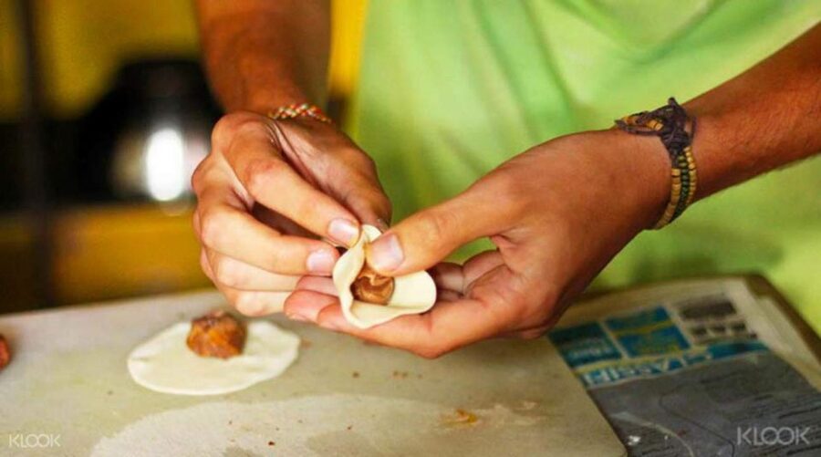 Kathmandu: Nepali Cooking Class with Hotel Pickup - The cooking class itself: momo, curries, roti-style bread, and sel roti