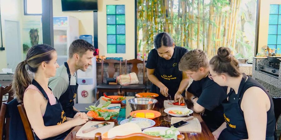 Khao Lak Pui's Authentic Thai Cooking Class - Cooking as a group: how the family-style meal works