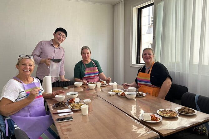 Korea Cooking Class with 3 stars Michelin Chef & Content creators - The group kitchen setup: why 2–4 people per station is a win