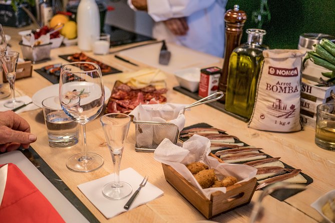 La Boqueria Market and Paella Cooking Class in Barcelona - What the apartment meal feels like when it’s time to eat