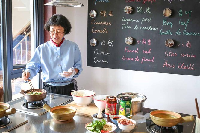Lijiang Naxi Cuisine Cooking Class & Market Visit - Key highlights at a glance