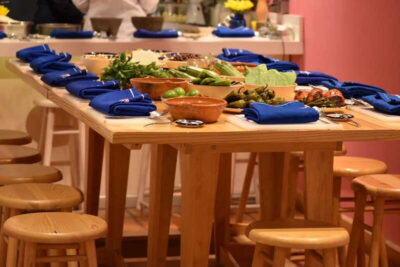 Mexico City: Mexican Salsas Cooking Class and Market Tour - Finding Aura Cocina Mexicana: The Blue Shopfront on Medellín Street