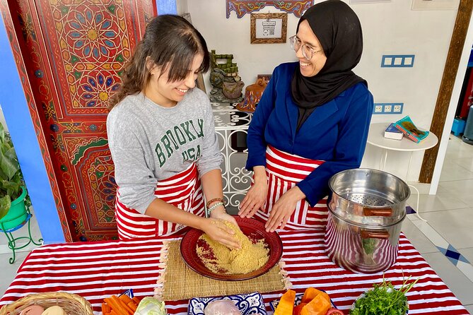 Moroccan Cooking Class with a Local Family & Market Visit - Couscous or tajine: your hands-on menu