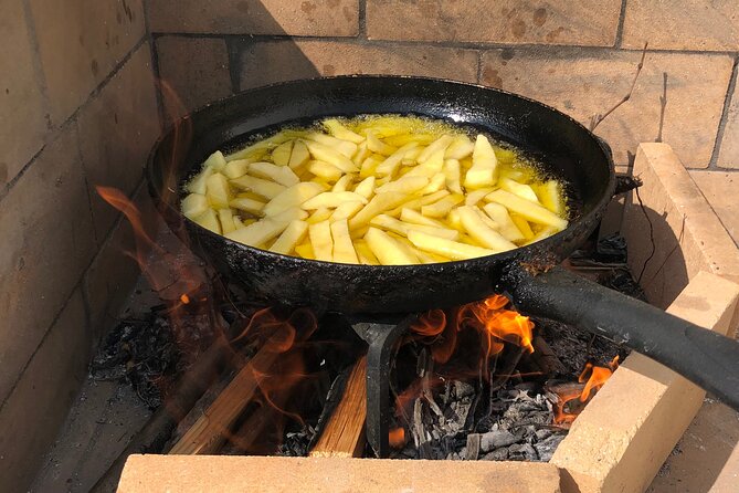 Naxos Perivoli Farm Experience & Wood-fire Cooking Class - The wood-fire cooking class: chopping, cooking, and feasting