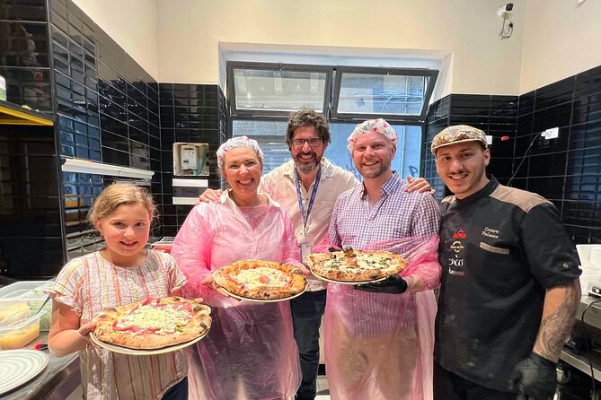 Pizza cooking class in real Pizzeria with Pizza chef & Tour guide - The wooden oven moment: timing, heat, and pizza reality