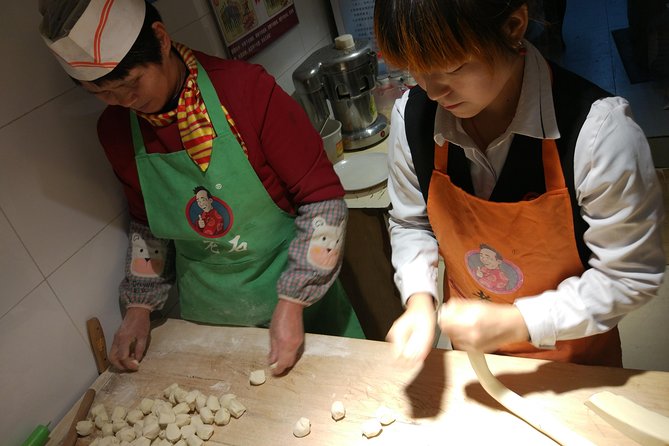 Private Hutong Culture Tour with Dumpling Cooking Class plus Cricket Fighting Game - Rickshaw through the hutongs, then dumplings with a local family