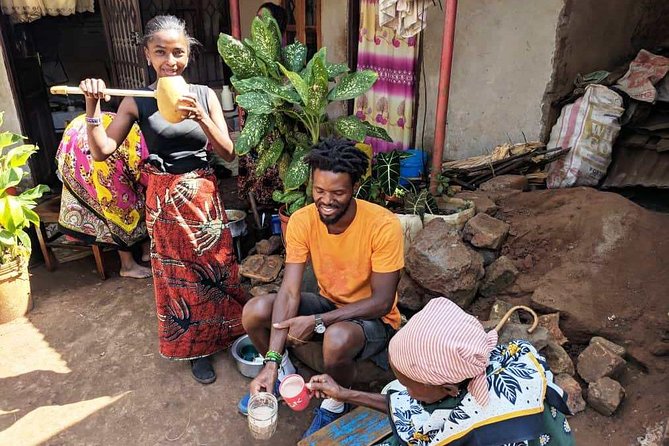 Private Market Tour and Tanzanian Cooking Class in Moshi - The outdoor meal: ugali with peanut brittle and homemade alcohol