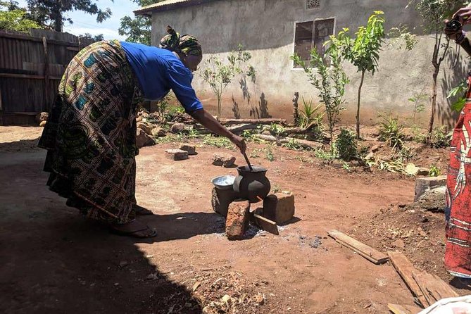 Private Market Tour and Tanzanian Cooking Class in Moshi - Shida’s mud house: coconut milk the traditional way with the buzi