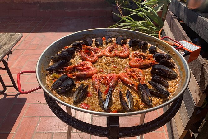 Rooftop Paella Seafood Cooking Class Experience in Barcelona - The rooftop terrace moment: sunset service and old-port views