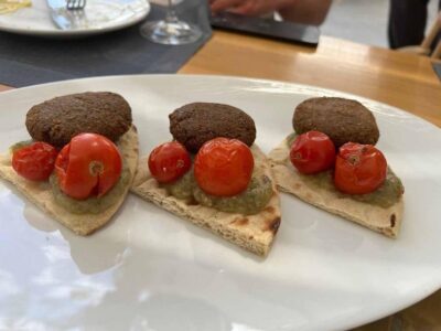 Santorini: Private Cooking Class and Wine Tasting Tour - Volcanic vineyards and basket vines: seeing the grape-growing system