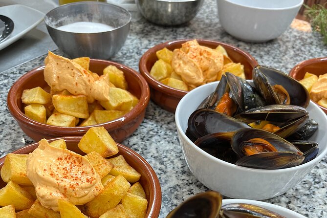 Seafood paella cooking class, tapas and visit to Ruzafa market. - Mercado de Ruzafa to Paella Pan: The Core Idea