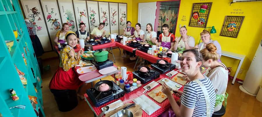 Seoul: Korean Cooking Class at a Local Home and Market Tour - Four classic dishes you’ll cook step by step