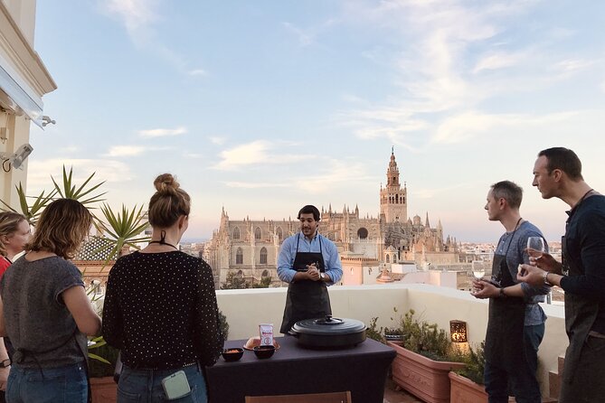 Sevilla: Rooftop Paella Cooking Class & 30-minute expert Q&A - The warm start: welcome drink, appetizers, and set-up