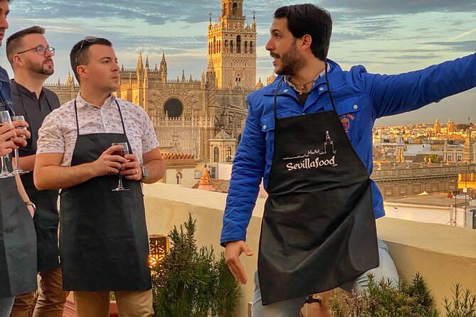 Sevilla: Rooftop Paella Cooking Class & 30-minute expert Q&A - Cooking paella with Fernando: hands-on, not just watching