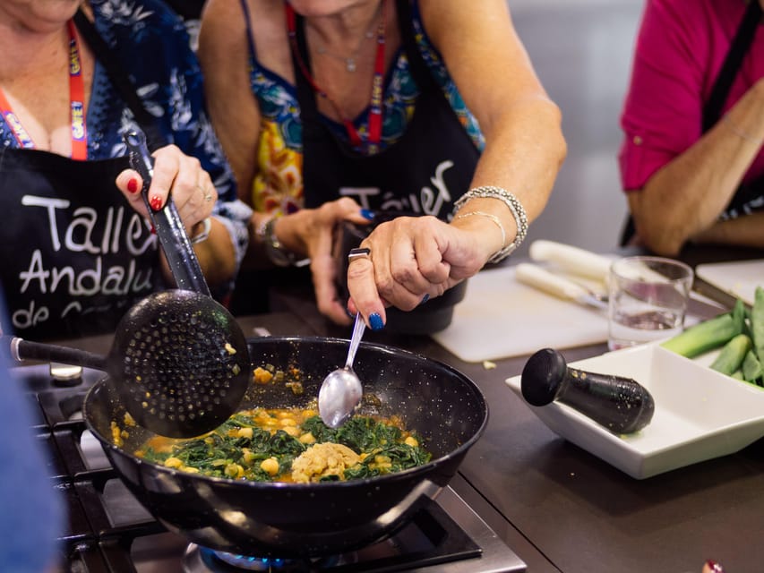 Seville: 3.5-Hour Spanish Cooking Class & Triana Market Tour - Inside the market kitchen: clean setup and real participation